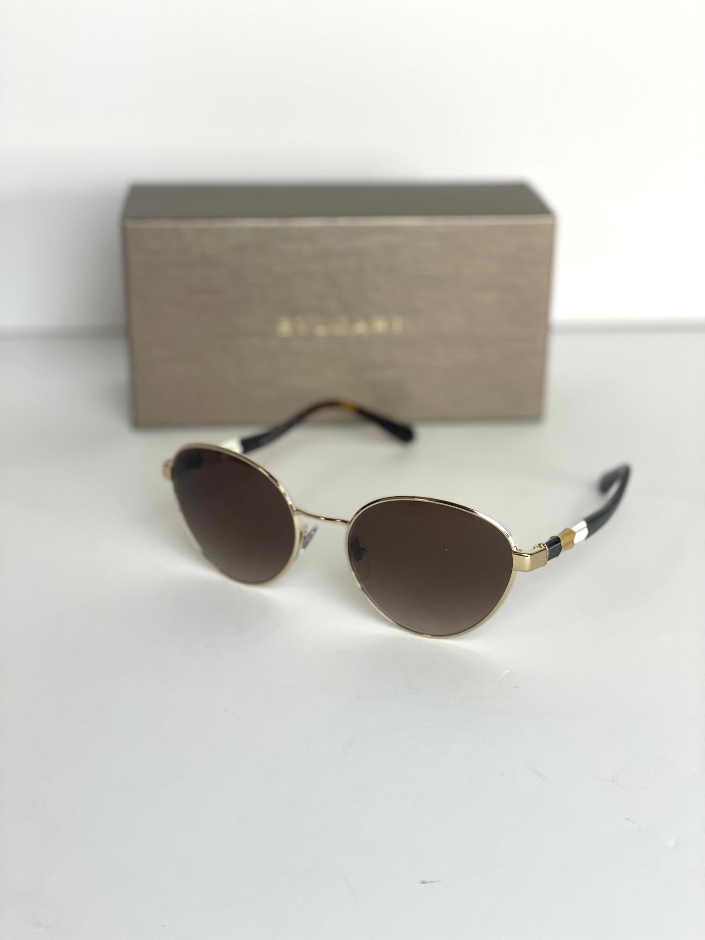 #3 Pre-owned Bulgari black and gold sunglasses