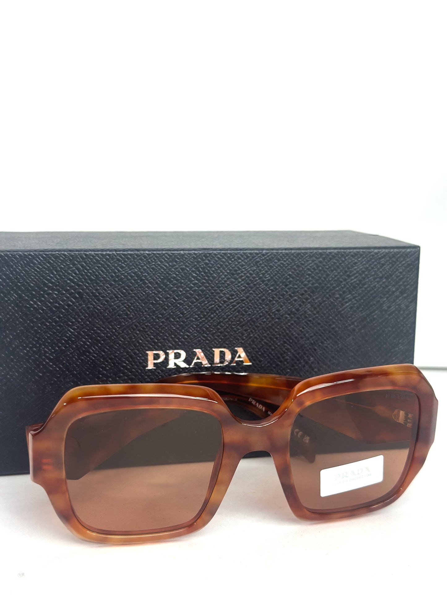#31 Prada Women's Light Tortoise Sunglasses