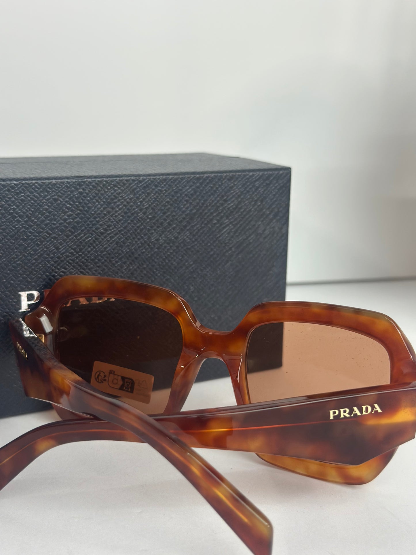 #31 Prada Women's Light Tortoise Sunglasses