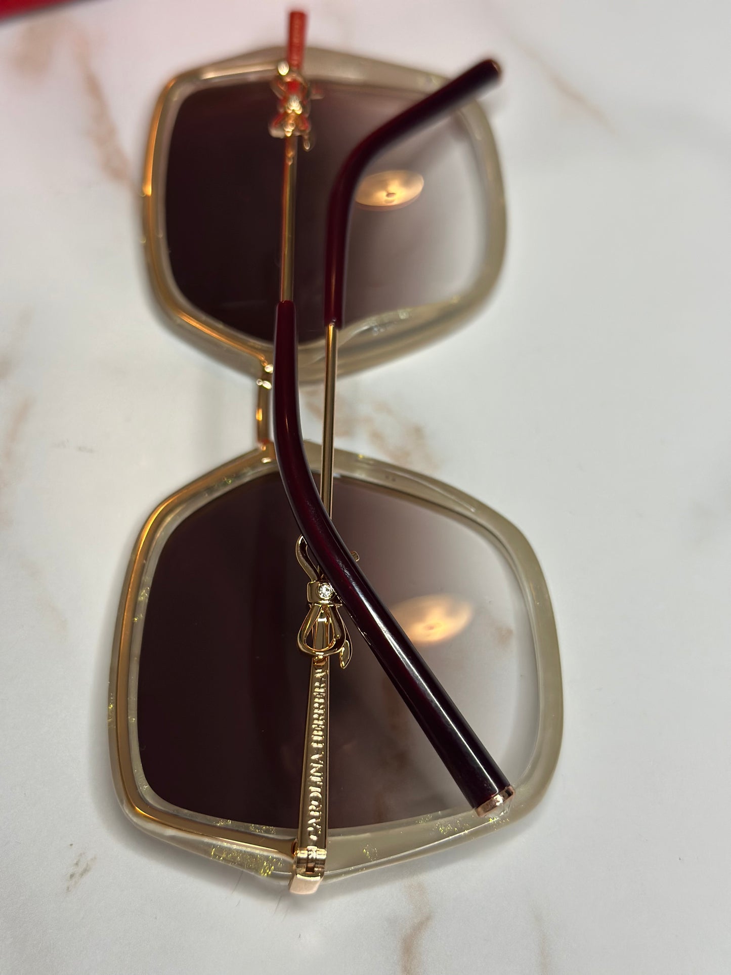 Pre-owned Carolina Herrera white sunglasses with bow detail