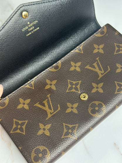 Pre-owned Louis Vuitton reverse monogram Sara wallet