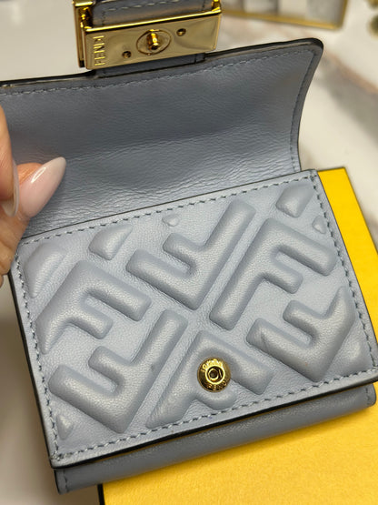 Pre-owned Fendi Micro Trifold Baguette wallet is made from light blue lambskin leather
