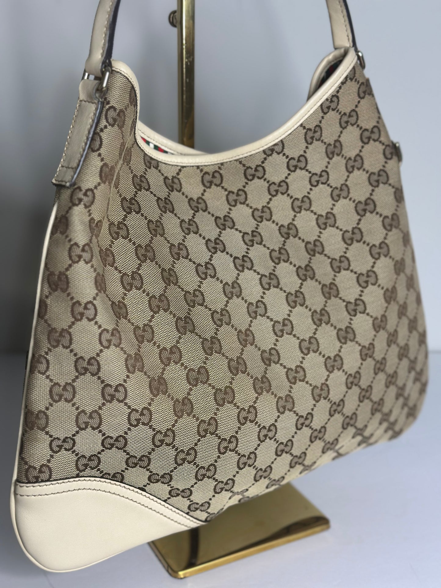 Pre-owned Gucci New Britt Hobo bag in beige and brown GG monogram canvas with white leather trim