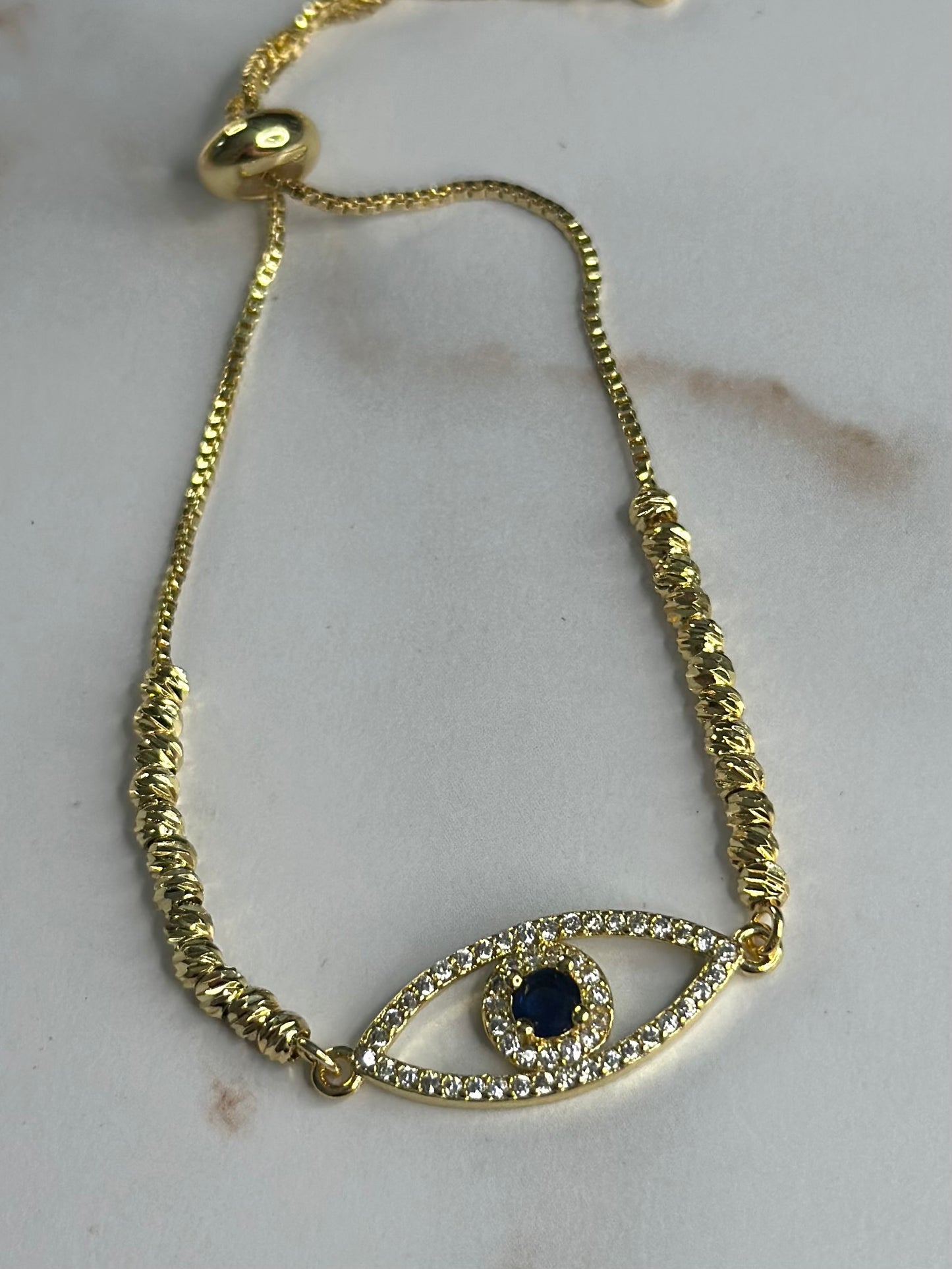Alicia’s signature all seeing eye bracelet