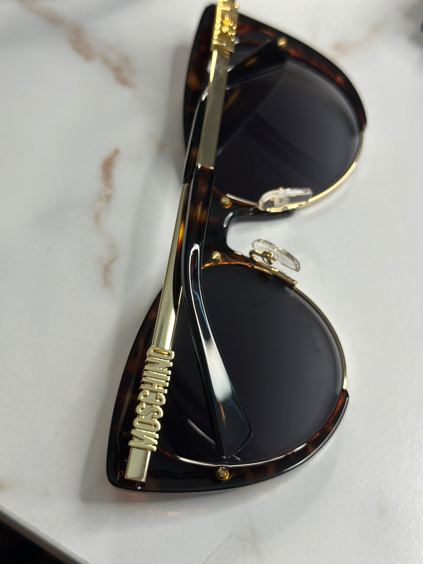 Pre-owned Moschino tortoise cat eye sunglasses