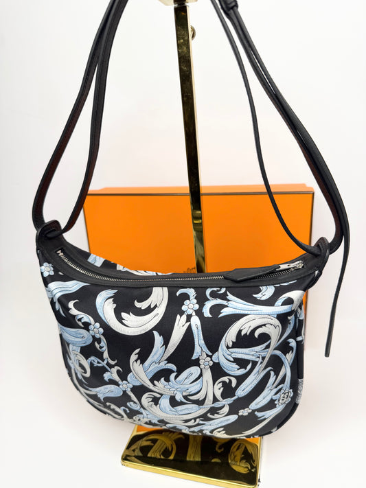 Pre-owned Hermes Sursoie To Go pouch silk and calfskin leather