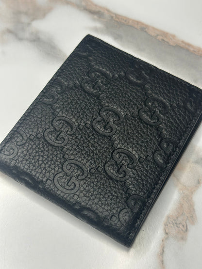 Pre-owned Gucci GG Embossed leather mens bi-fold wallet