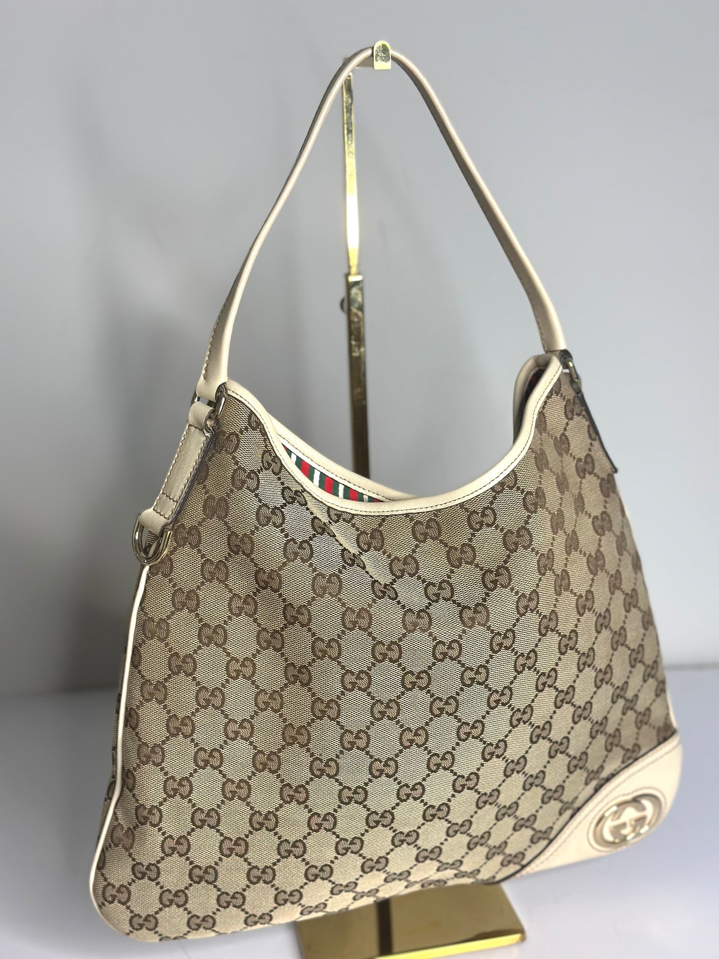 Pre-owned Gucci New Britt Hobo bag in beige and brown GG monogram canvas with white leather trim