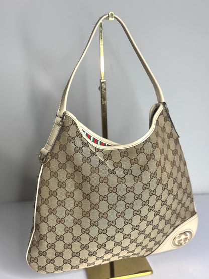 Pre-owned Gucci New Britt Hobo bag in beige and brown GG monogram canvas with white leather trim