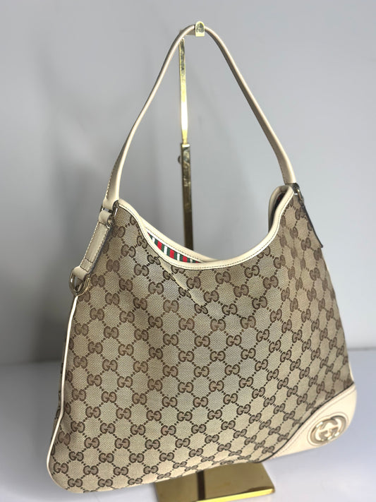 Pre-owned Gucci New Britt Hobo bag in beige and brown GG monogram canvas with white leather trim