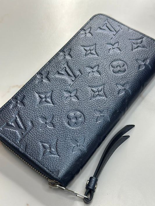 Pre-owned Louis Vuitton metallic navy empriente leather zippy wallet