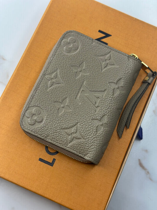 Pre-owned Louis Vuitton monogram Empriente leather compact zippy