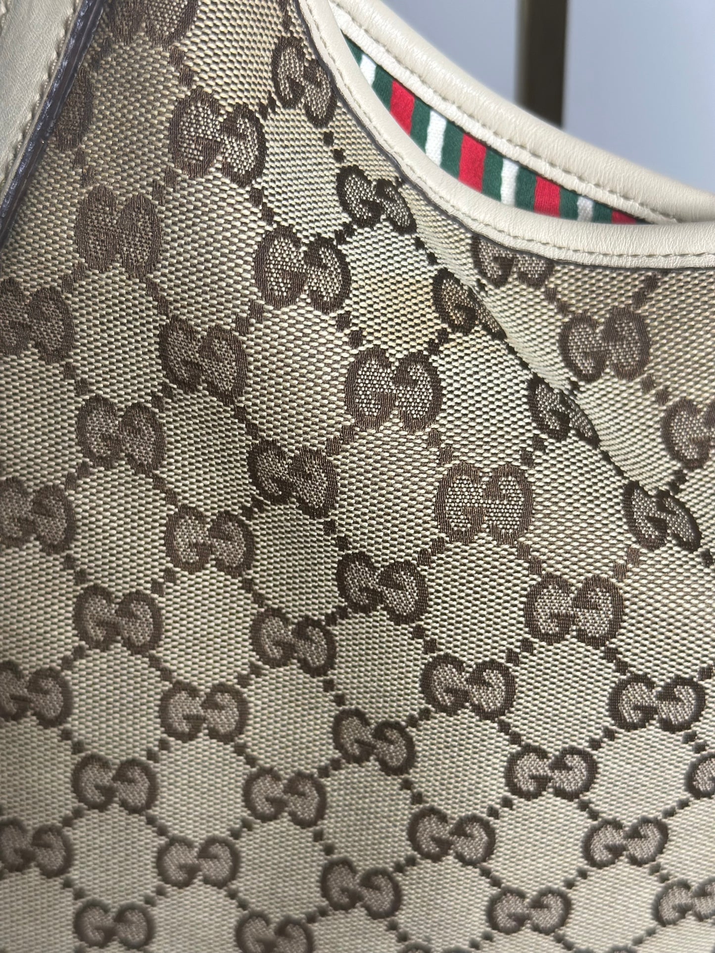 Pre-owned Gucci New Britt Hobo bag in beige and brown GG monogram canvas with white leather trim