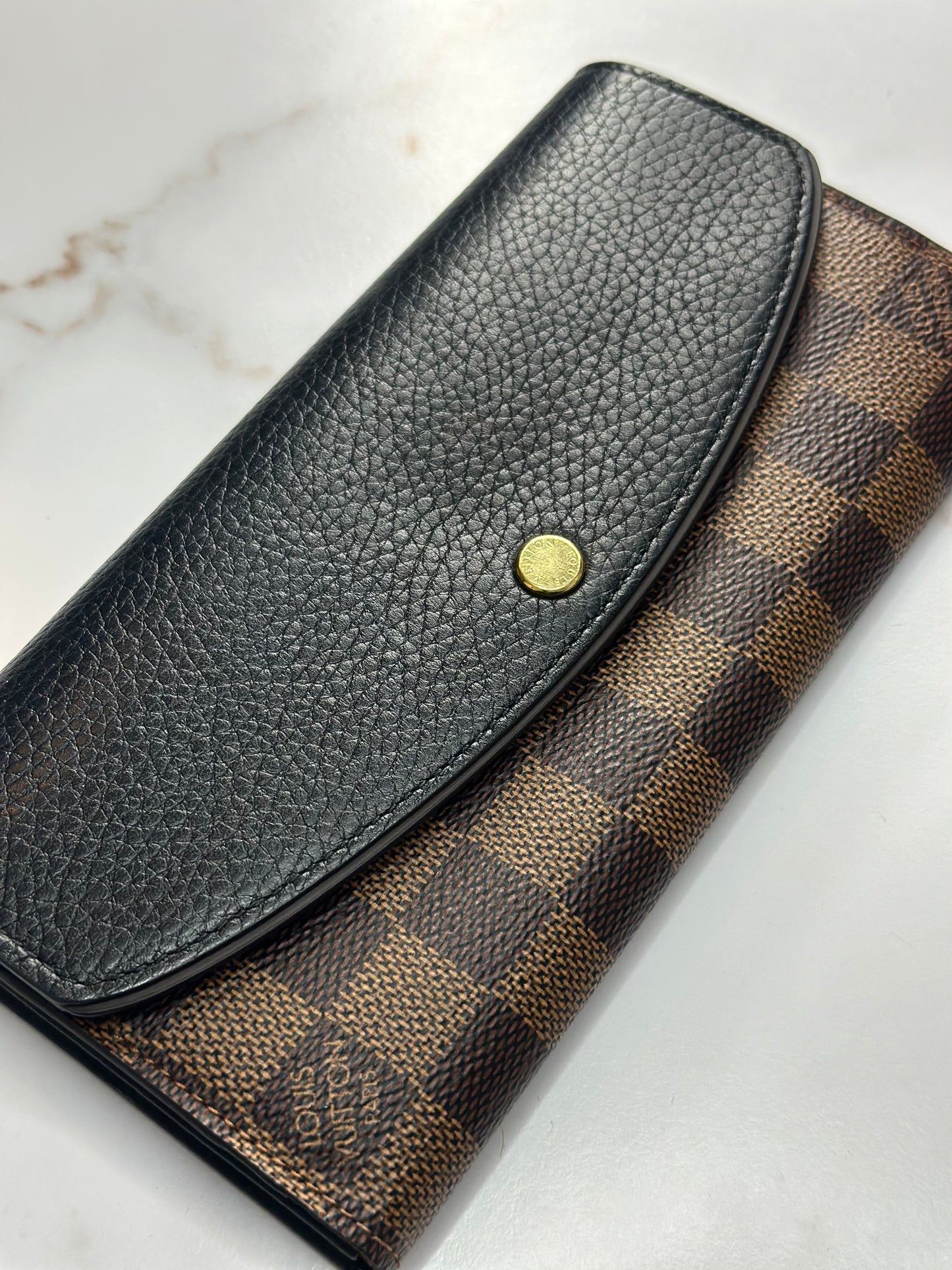 Pre-owned Louis Vuitton Normandy wallet in Damier Ebene canvas and black leather