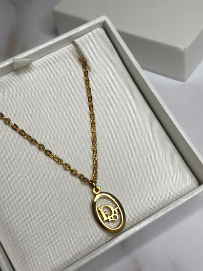 Pre-owned Christian Dior gold-plated vintage oval logo pendant necklace