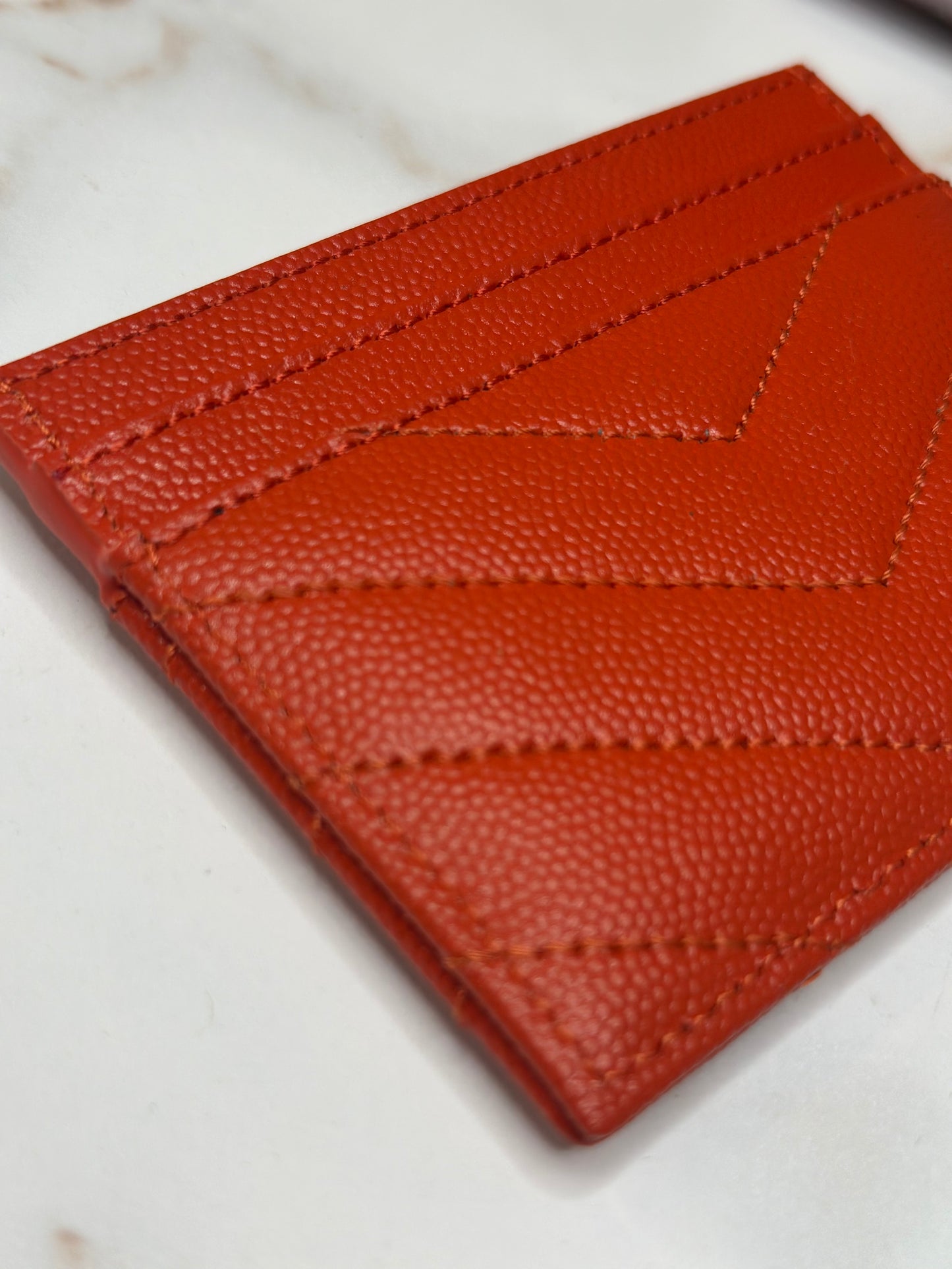 Pre-owned Saint Laurent orange-red grain de poudre card holder