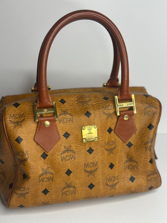 Pre-owned MCM vintage Boston bag in cognac Visetos monogram canvas with brown leather handles