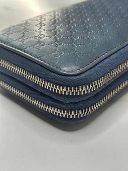 Pre-owned Gucci Microguccissima double zip-around wallet in blue leather