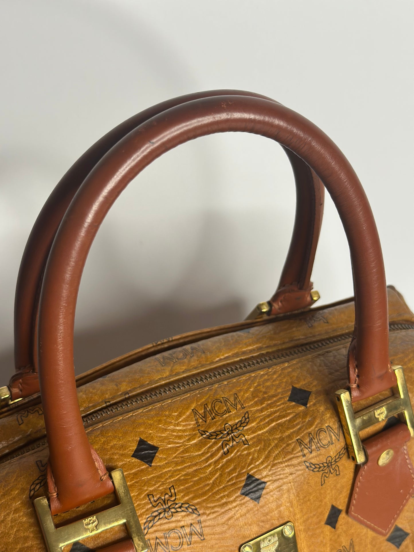 Pre-owned MCM vintage Boston bag in cognac Visetos monogram canvas with brown leather handles