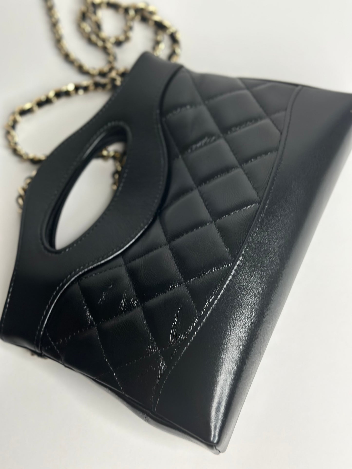 Pre-Owned Chanel Shiny Crinkled Calfskin Quilted Nano 31 Shopping Bag Black