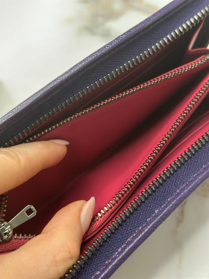 Pre-owned Loewe Anagram continental zip wallet in pebble-grained lilac purple leather
