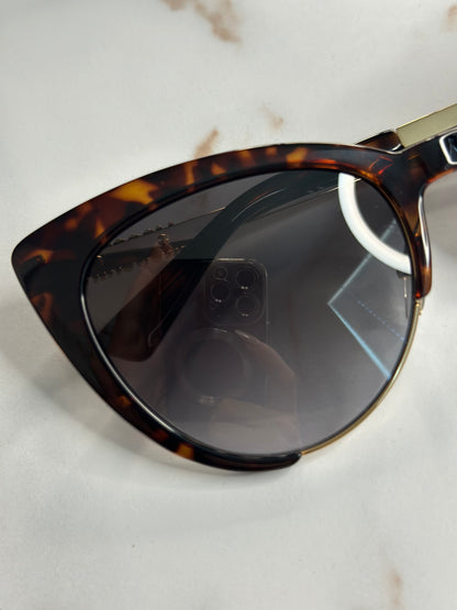 Pre-owned Moschino tortoise cat eye sunglasses