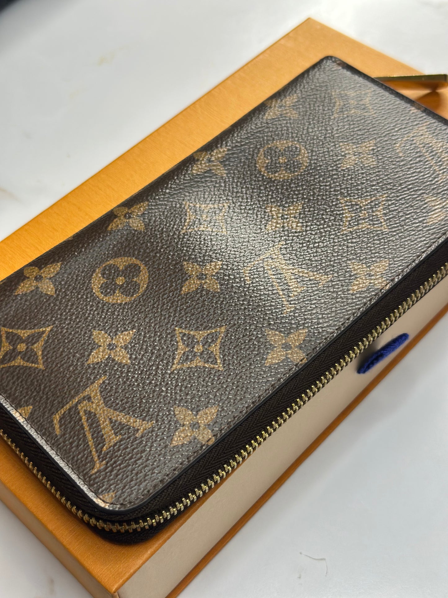 Preowned Louis Vuitton, monogram, canvas, zippy wallet red interior