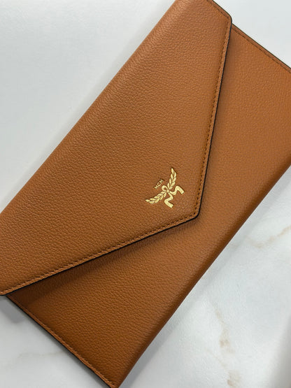 Pre-Owned MCM Himmel Continental Pouch in embossed cognac leather