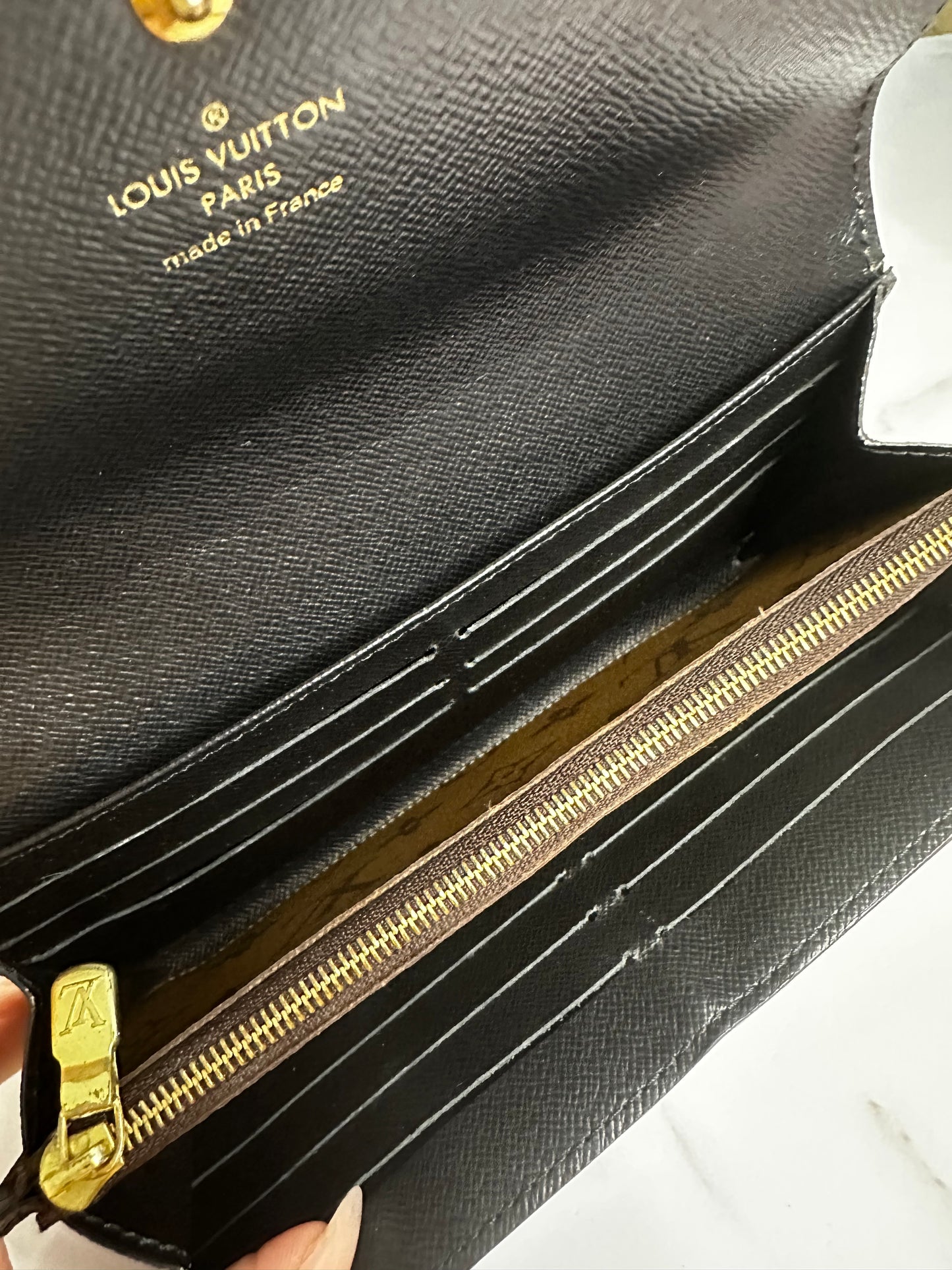 Pre-owned Louis Vuitton reverse monogram Sara wallet