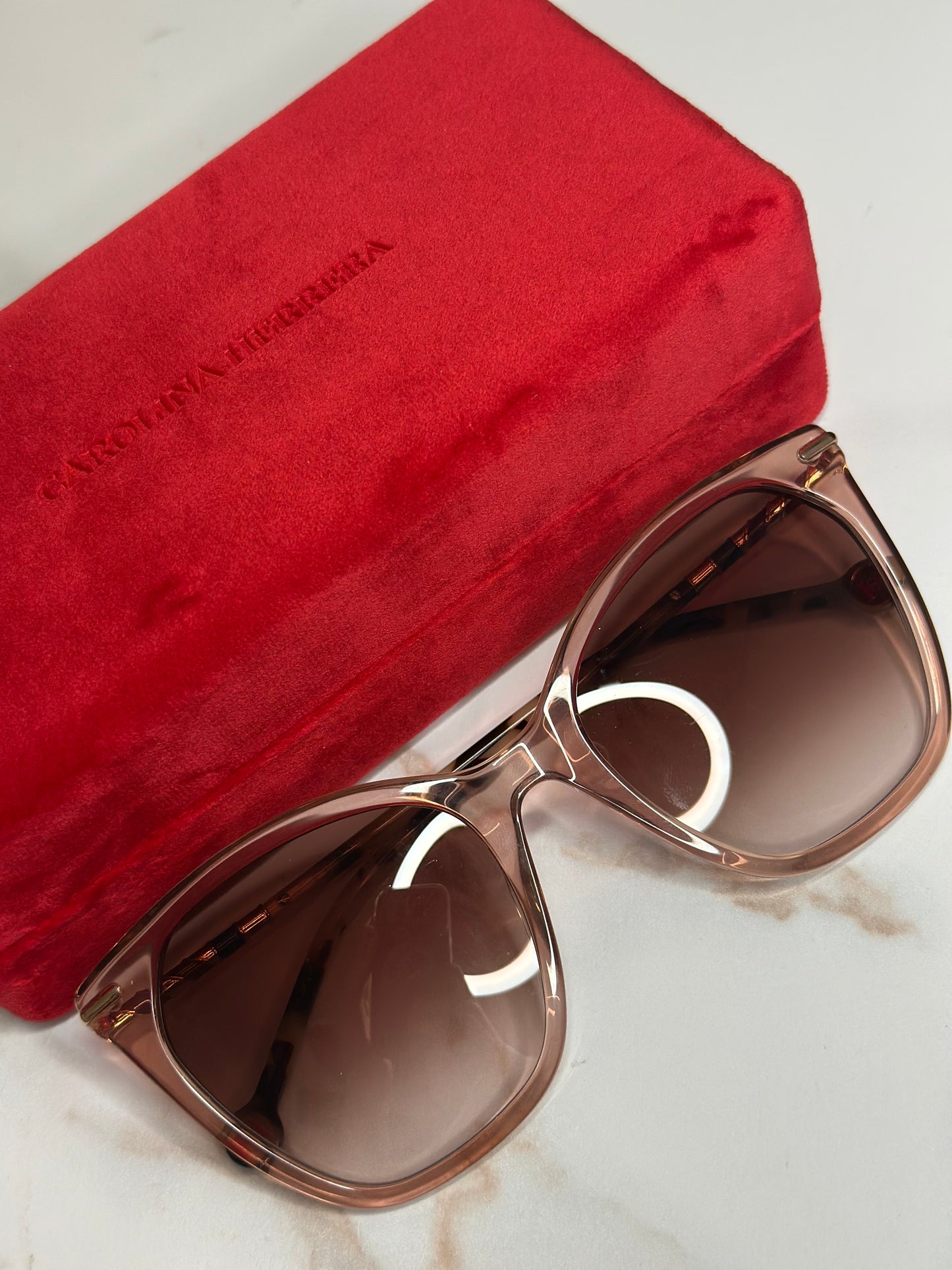 Pre-owned Carolina Herrera translucent neutral sunglasses with brown and teal enamel detail