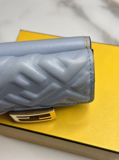 Pre-owned Fendi Micro Trifold Baguette wallet is made from light blue lambskin leather