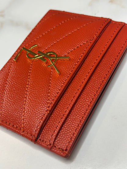 Pre-owned Saint Laurent orange-red grain de poudre card holder
