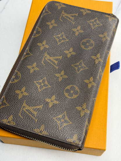 Pre-owned Louis Vuitton monogram, canvas zippy organizer wallet