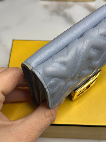 Pre-owned Fendi Micro Trifold Baguette wallet is made from light blue lambskin leather