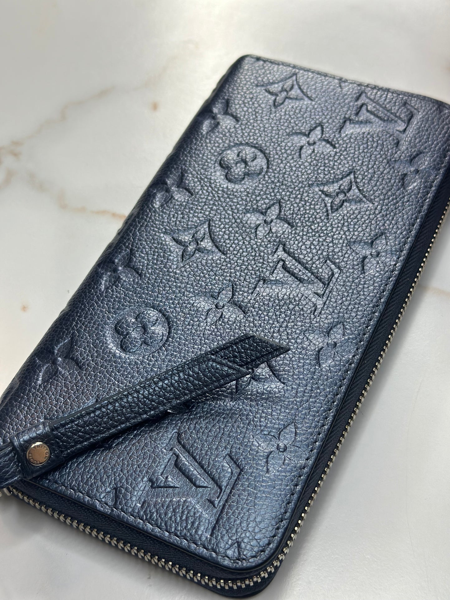 Pre-owned Louis Vuitton metallic navy empriente leather zippy wallet