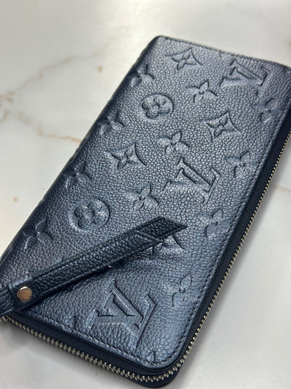 Pre-owned Louis Vuitton metallic navy empriente leather zippy wallet