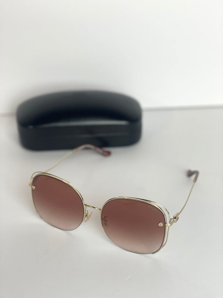 #50 Pre-owned Coach shiny light gold sunglasses