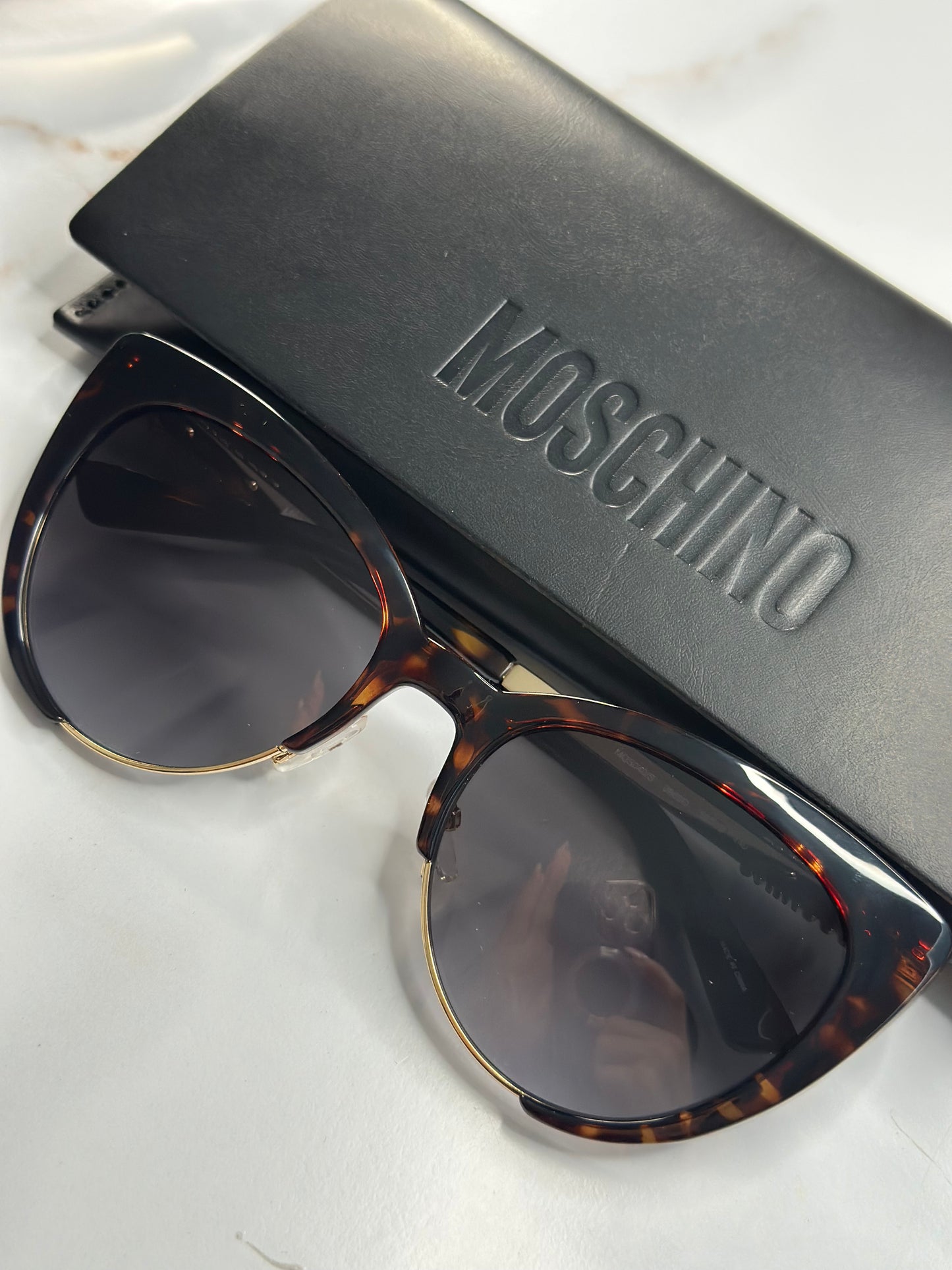 Pre-owned Moschino tortoise cat eye sunglasses