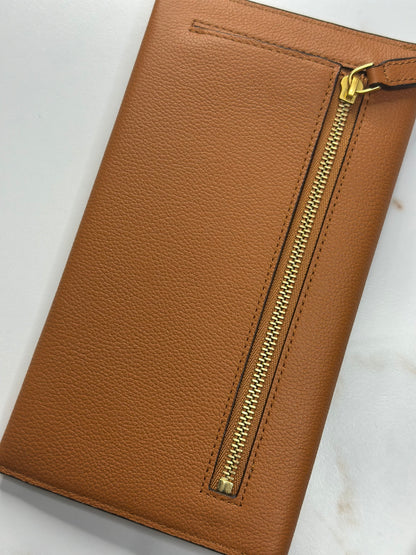 Pre-Owned MCM Himmel Continental Pouch in embossed cognac leather