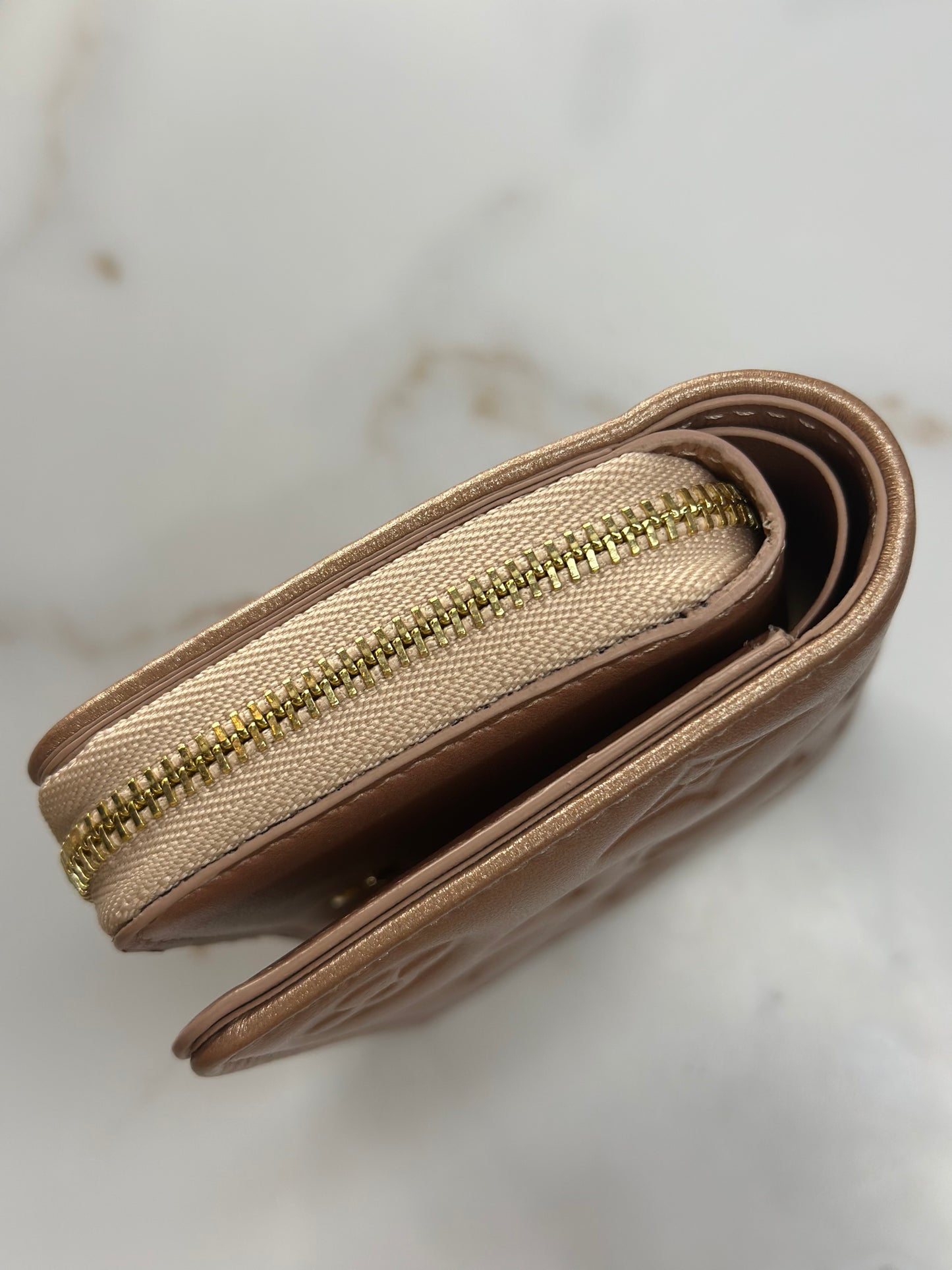 Pre-owned Louis Vuitton Lambskin Embossed Monogram Lou Coussin Wallet Rose Gold