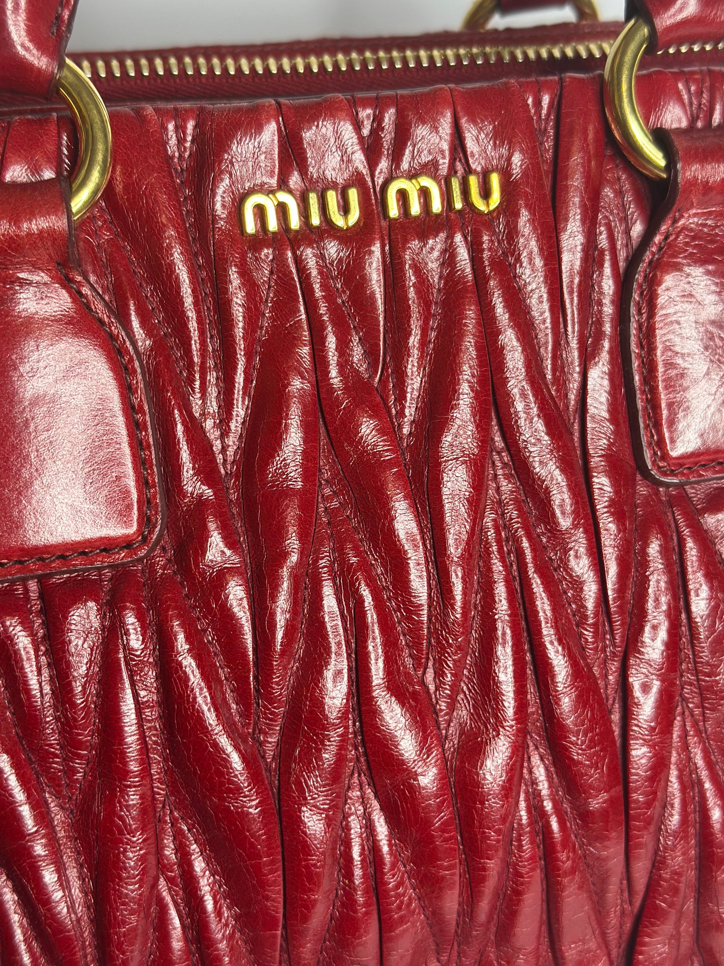 Pre-owned Miu Miu Matelassé 2-way bauletto tote bag in red leather with gold-tone hardware