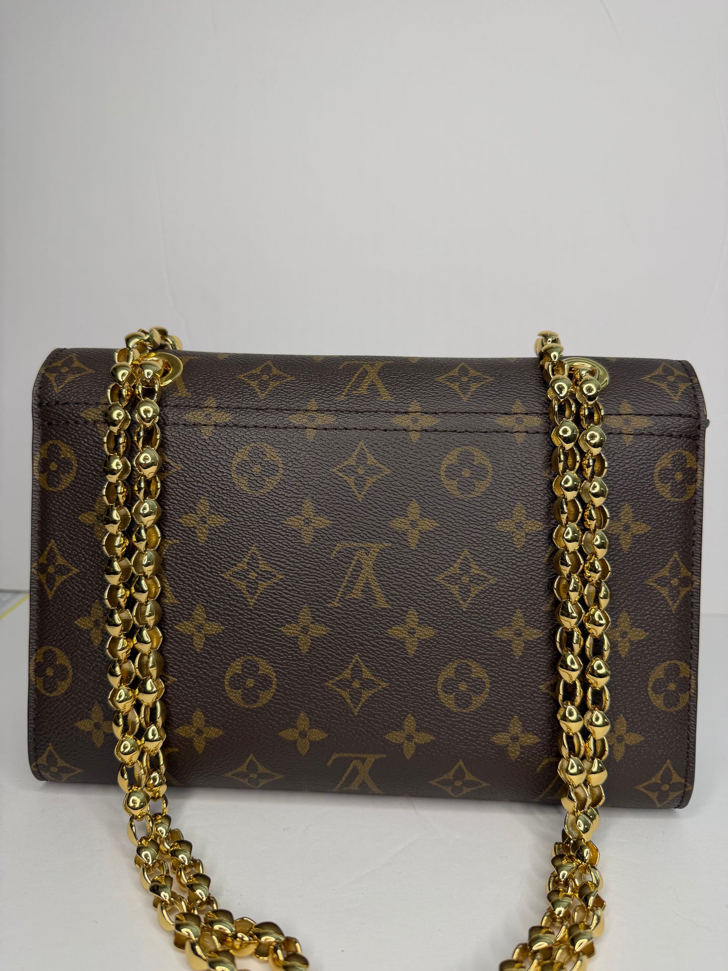 Pre-owned Louis Vuitton monogram canvas victorie shoulder bag