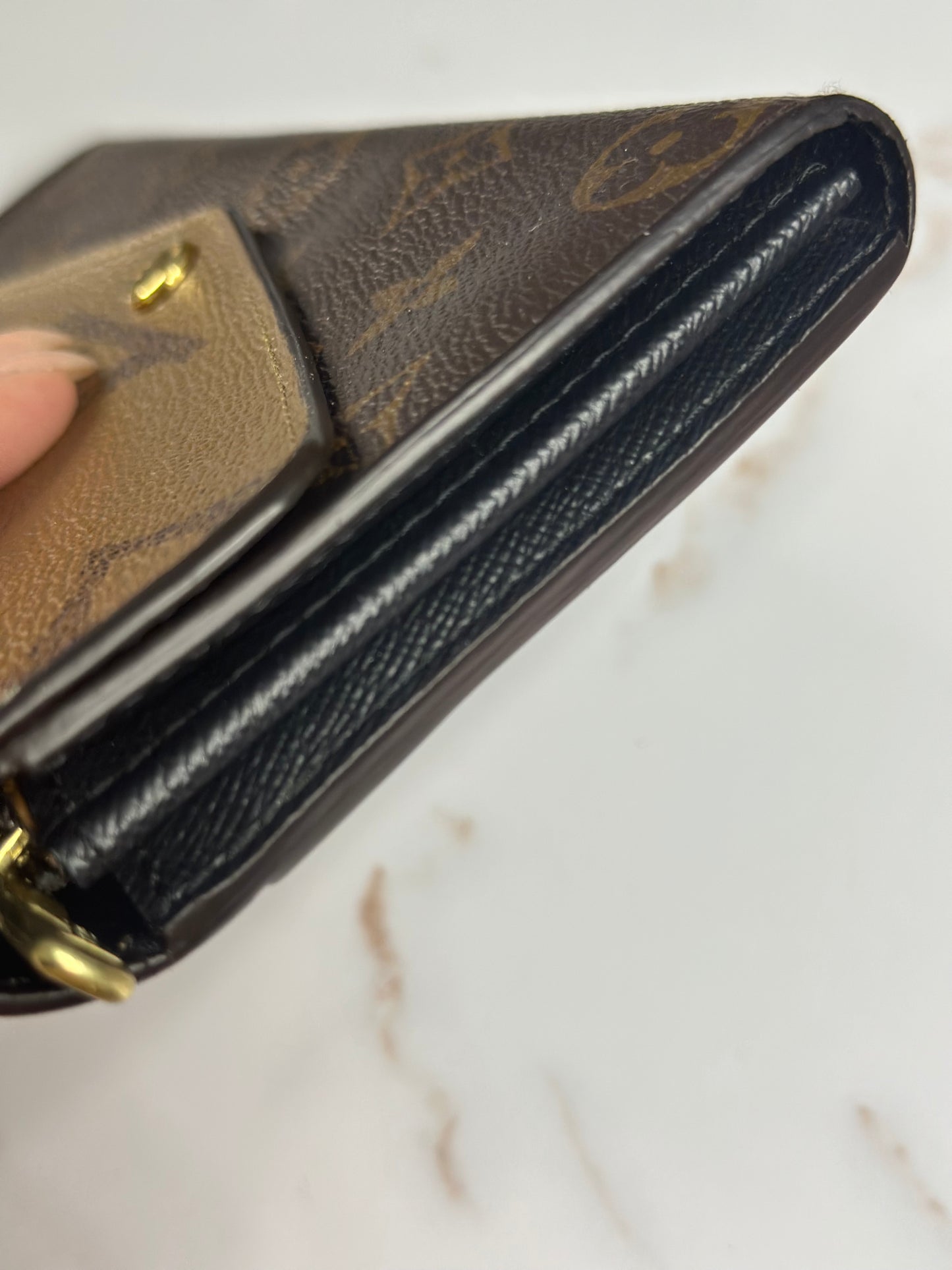 Pre-owned Louis Vuitton reverse monogram Sara wallet