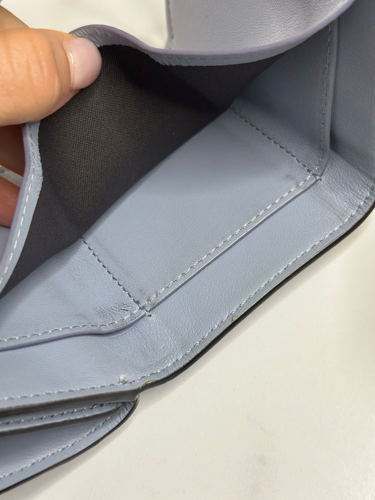 Pre-owned Fendi Micro Trifold Baguette wallet is made from light blue lambskin leather