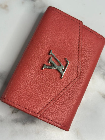 Pre-owned Louis Vuitton Coral leather lock me compact wallet