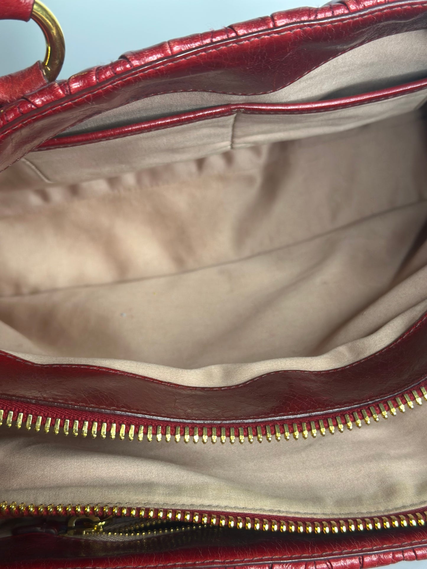 Pre-owned Miu Miu Matelassé 2-way bauletto tote bag in red leather with gold-tone hardware