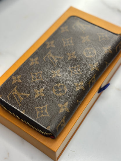 Preowned Louis Vuitton, monogram, canvas, zippy wallet red interior