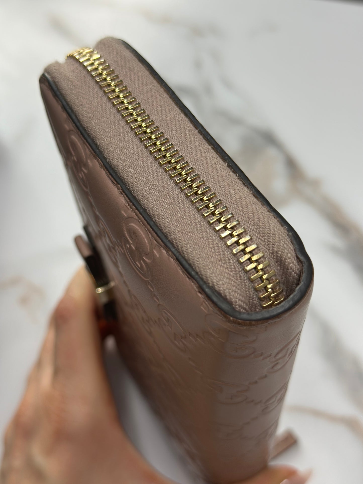 Pre-owned Gucci Guccissima continental zip-around wallet with a bow detail in a rose beige leather