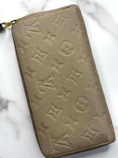 Pre-owned Louis Vuitton beige Empriente leather zippy wallet