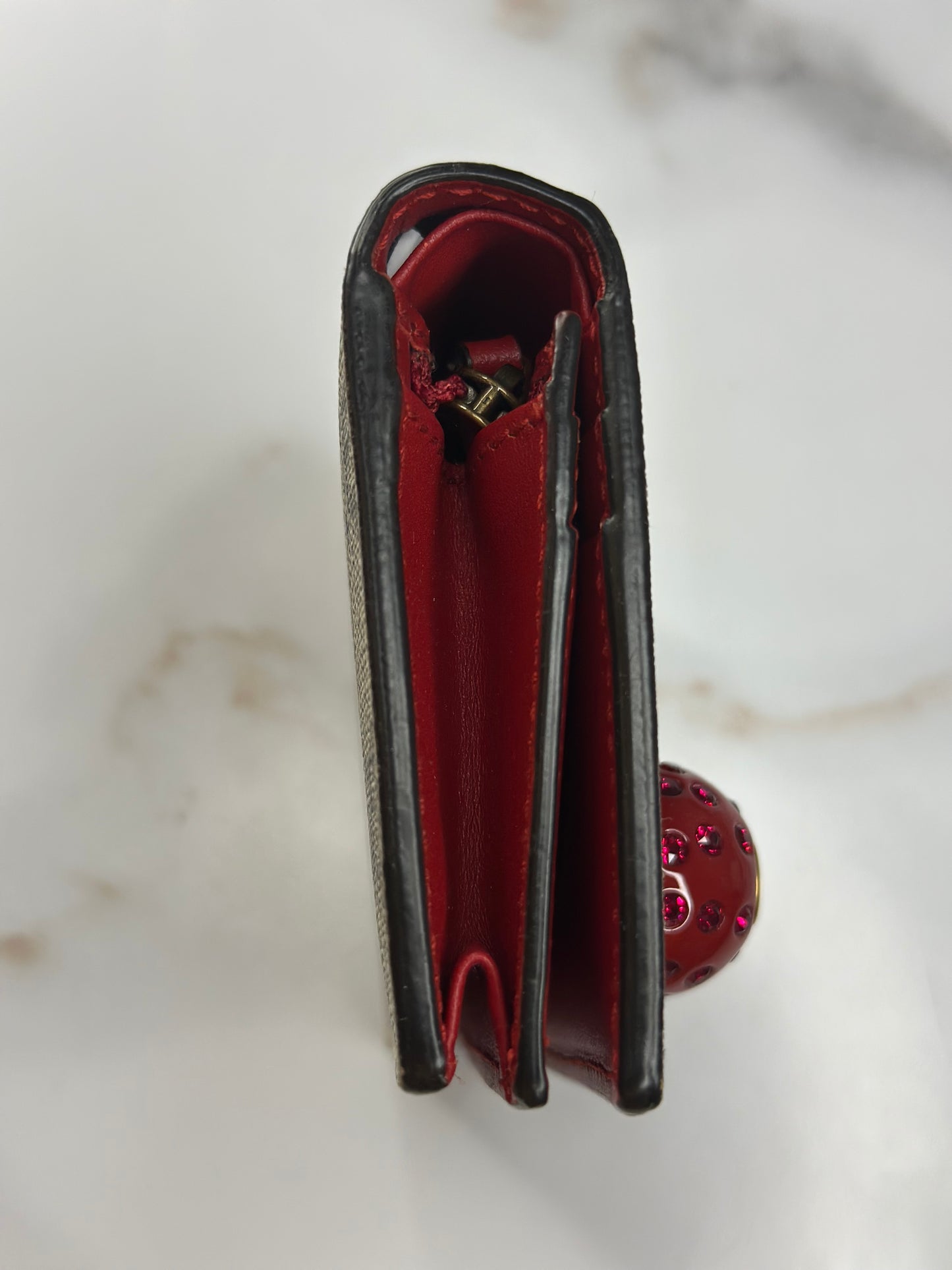 Pre-owned Gucci GG Supreme canvas bifold or compact wallet with a cherry embellishment.